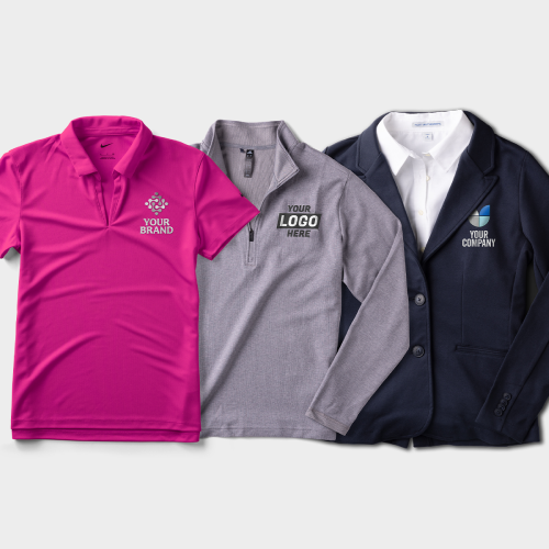 A polo shirt, button up, and blazer are laid one on top of the other.